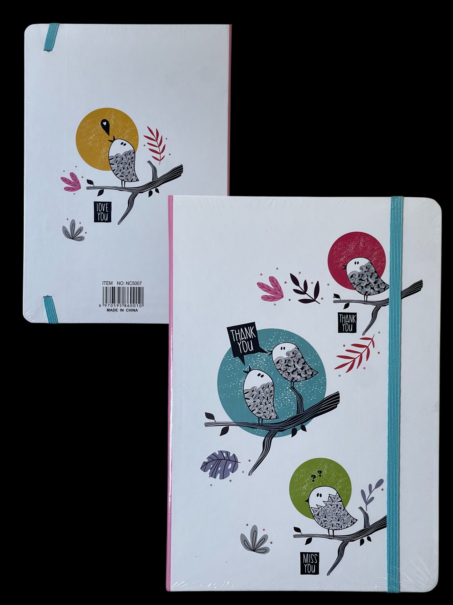 Two notebooks with bird illustrations on a white background
